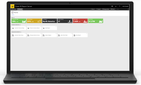 Photograph shows a laptop that displays the Power B I Report Server web portal.